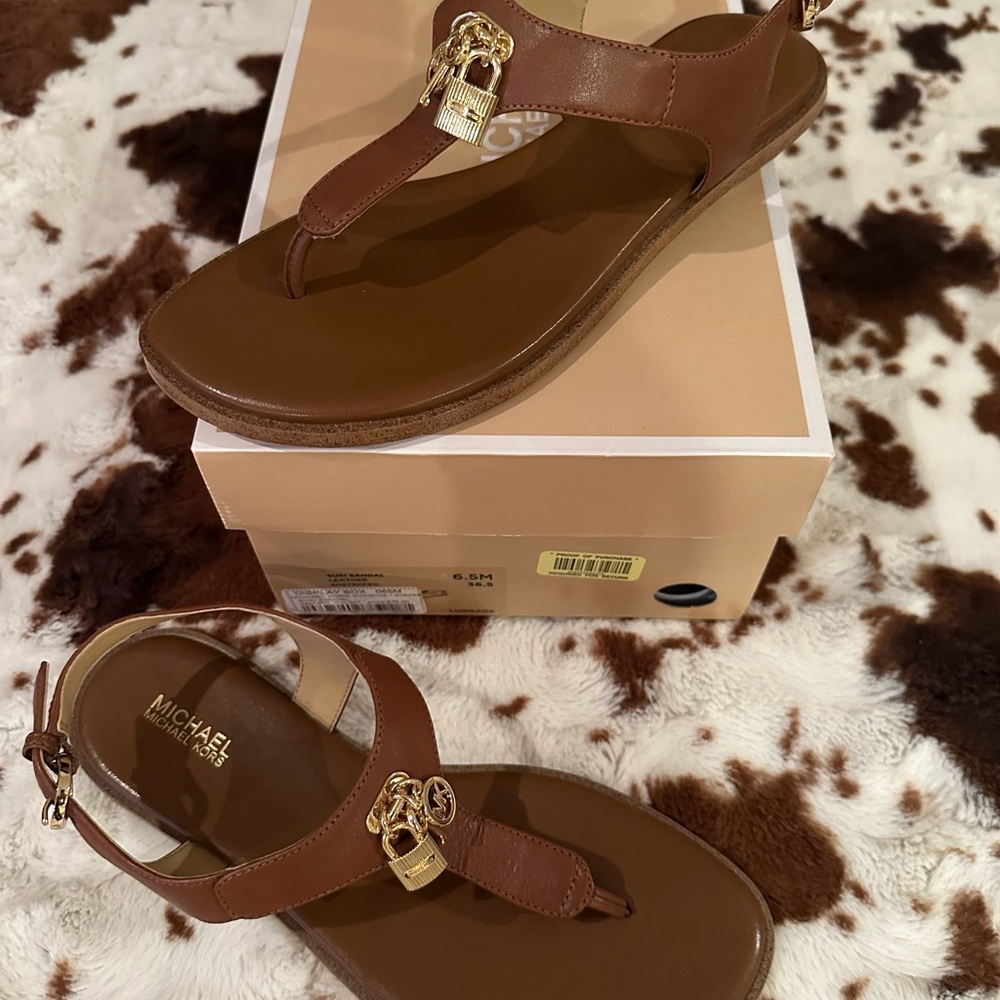 Michael Kors Brown Leather T-Strap Sandals with Gold Lock Charm